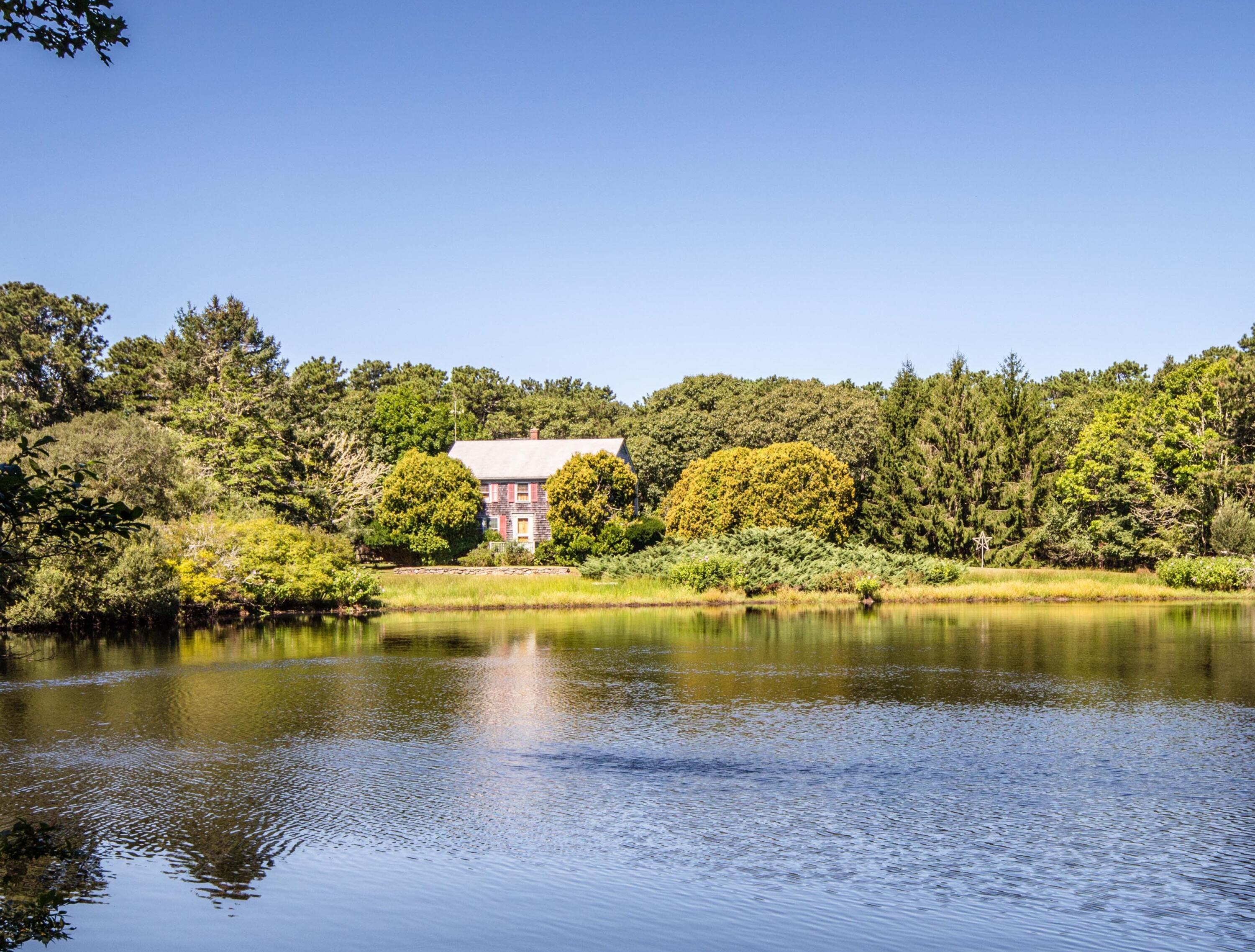 15 Jernegan Pond Road Edgartown, MA 02539 - Photo 1 of 31 a view of a lake with a city