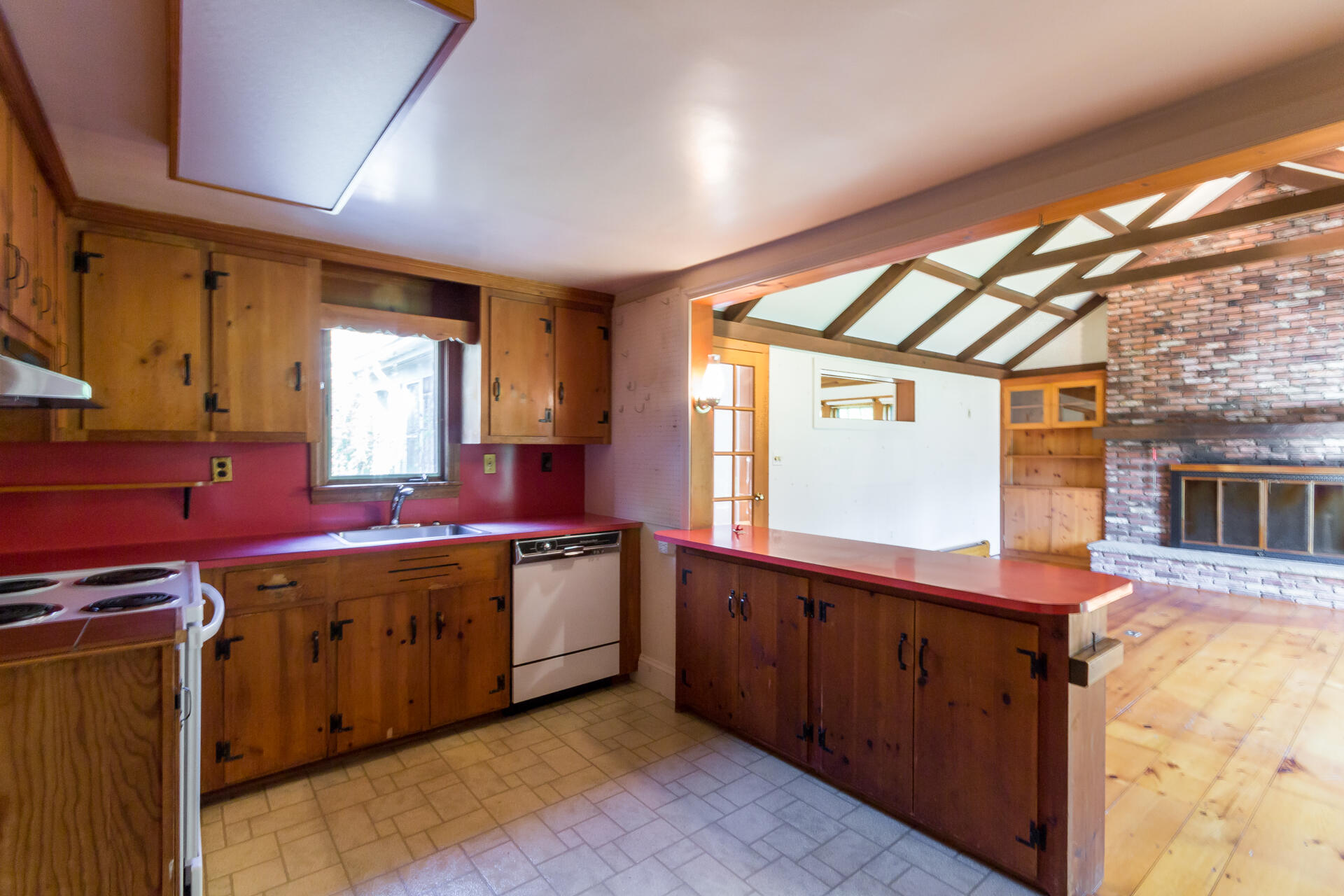 15 Jernegan Pond Road Edgartown, MA 02539 - Photo 15 of 31 a kitchen with a sink stove and cabinets