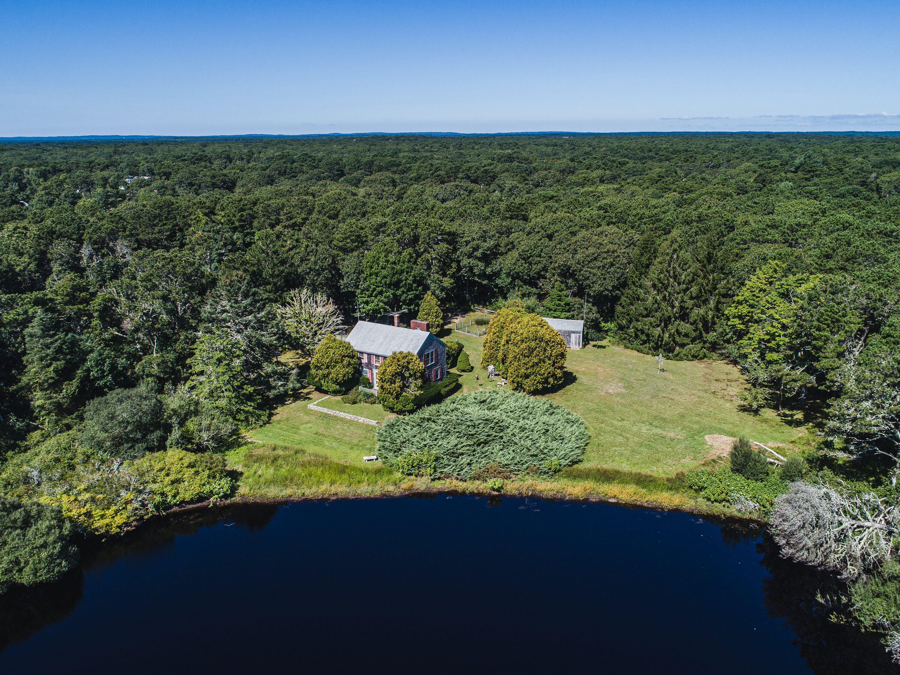 15 Jernegan Pond Road Edgartown, MA 02539 - Photo 2 of 31 a view of a outdoor space and a lake view