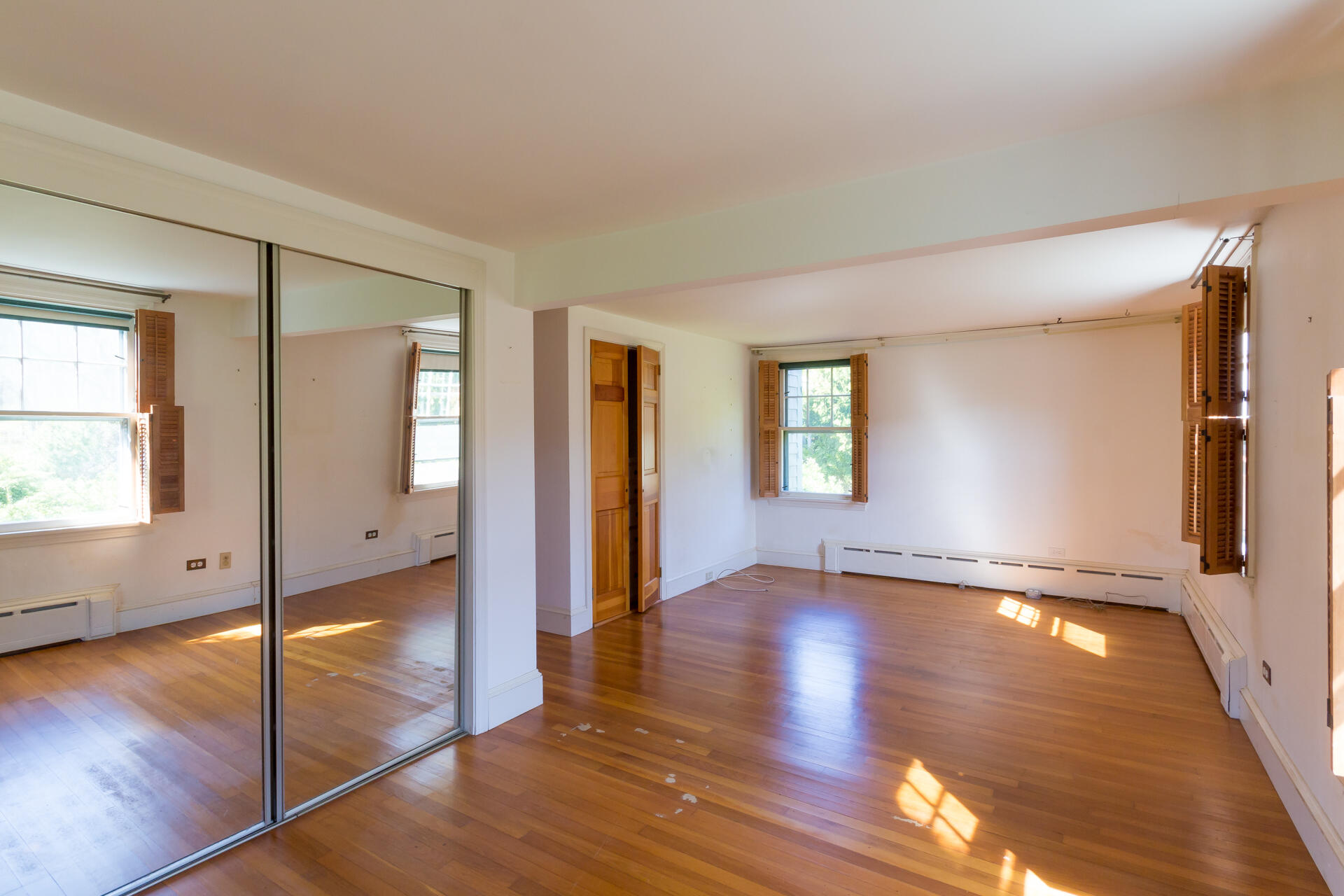 15 Jernegan Pond Road Edgartown, MA 02539 - Photo 22 of 31 a view of an empty room with window and wooden floor