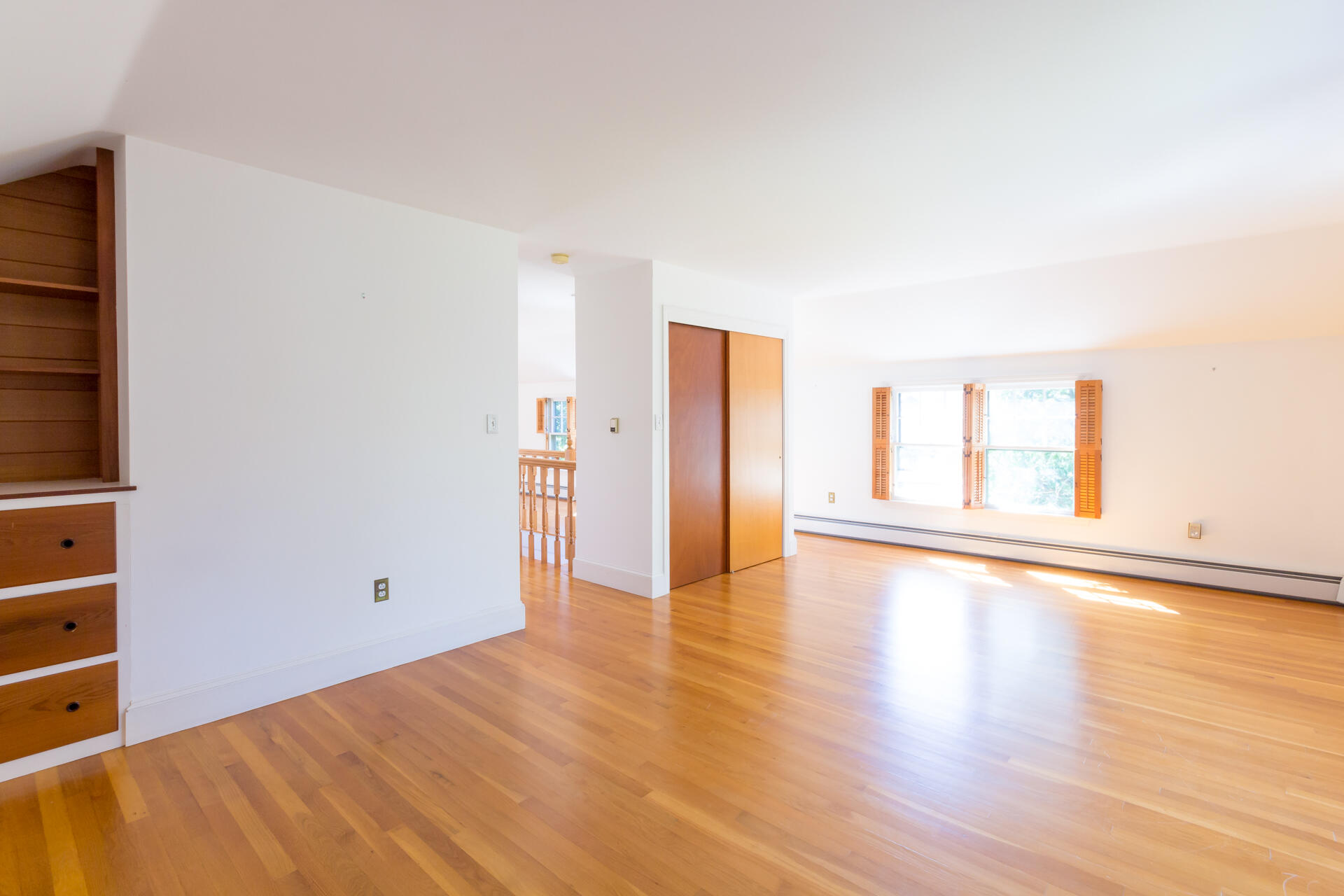 15 Jernegan Pond Road Edgartown, MA 02539 - Photo 25 of 31 a view of an empty room with wooden floor and a window