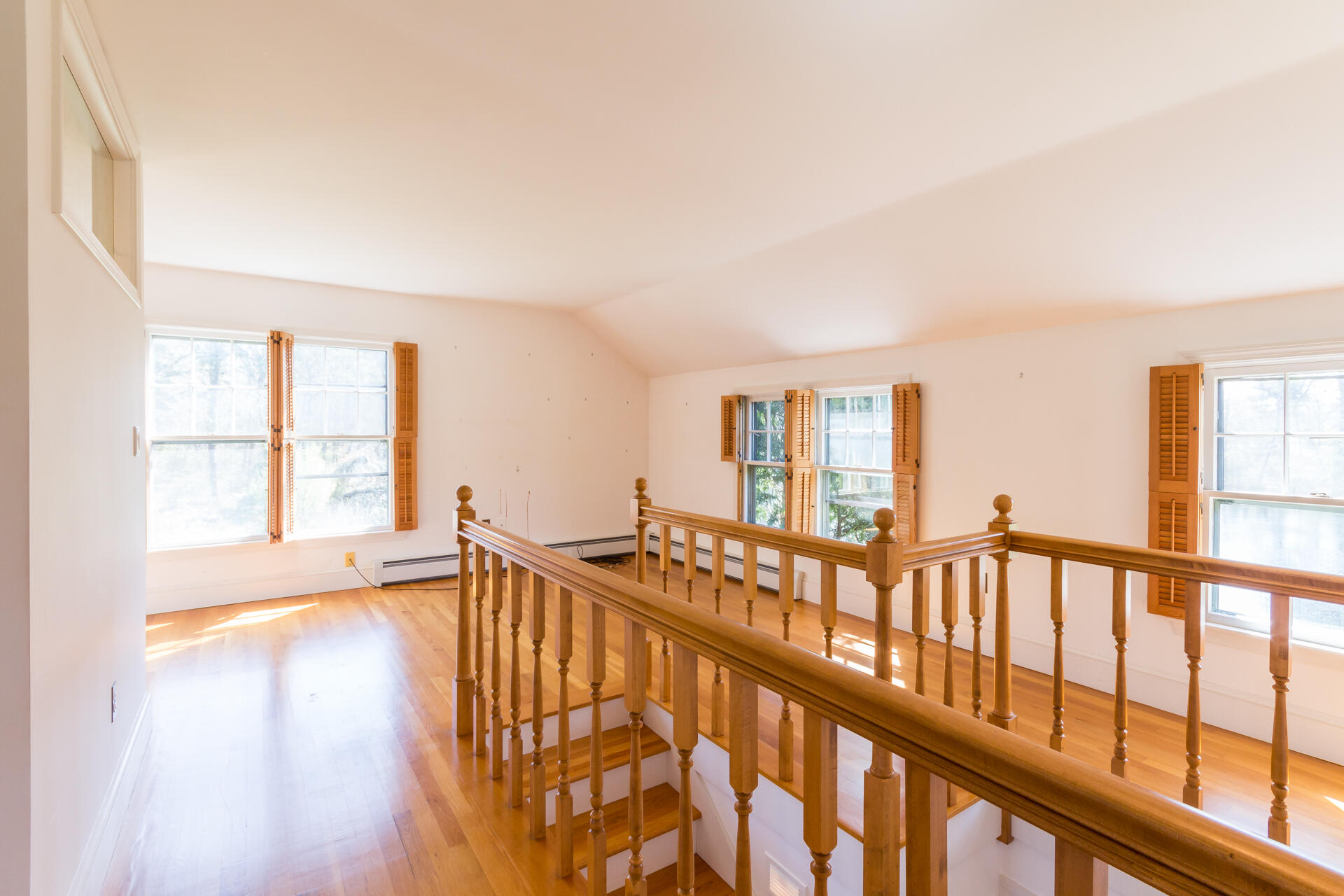 15 Jernegan Pond Road Edgartown, MA 02539 - Photo 27 of 31 a view of an empty room with wooden floor and a window