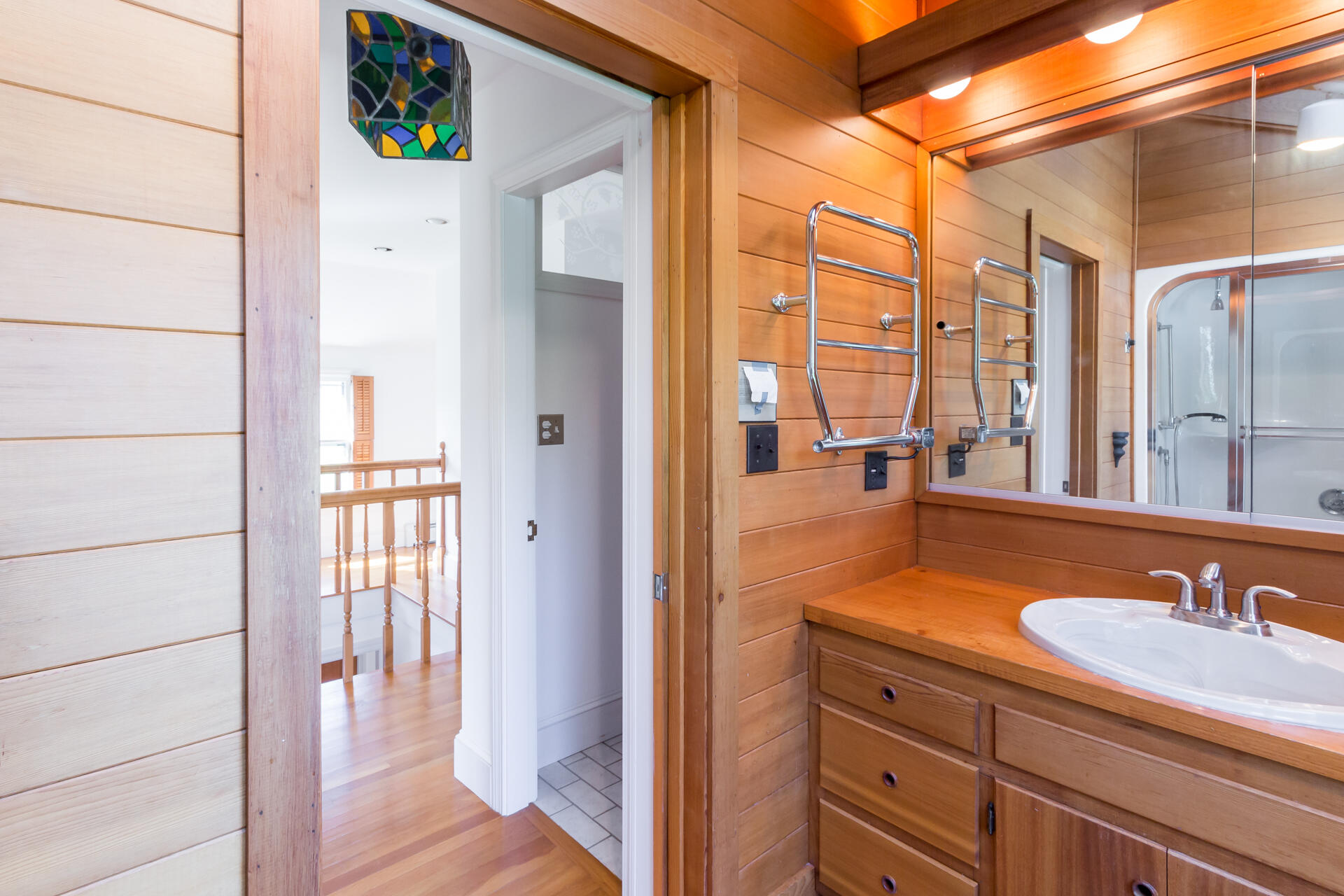 15 Jernegan Pond Road Edgartown, MA 02539 - Photo 29 of 31 a en suite bathroom with a granite countertop sink and a mirror