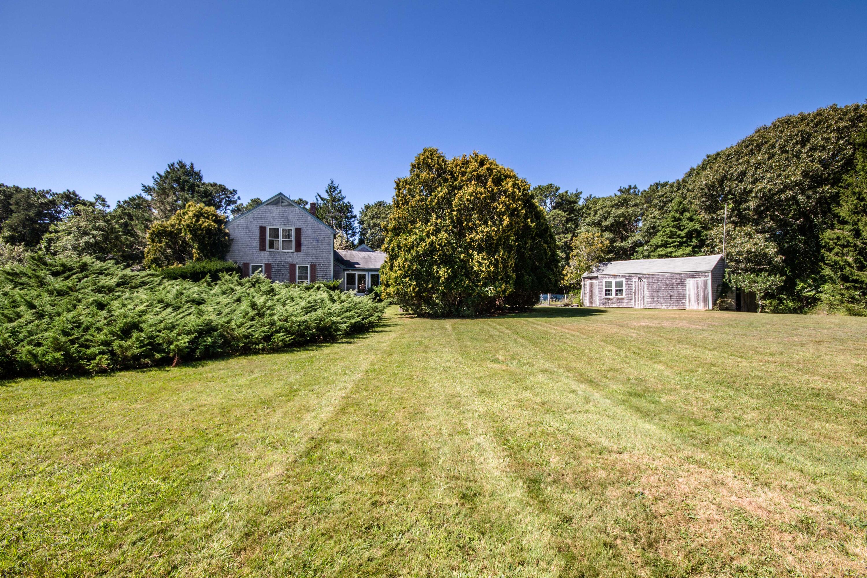 15 Jernegan Pond Road Edgartown, MA 02539 - Photo 5 of 31 a view of a house with a yard