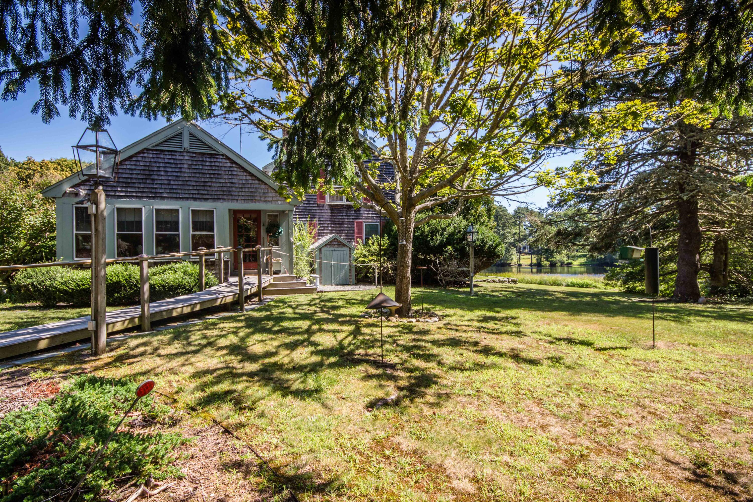 15 Jernegan Pond Road Edgartown, MA 02539 - Photo 6 of 31 front view of a house with a yard