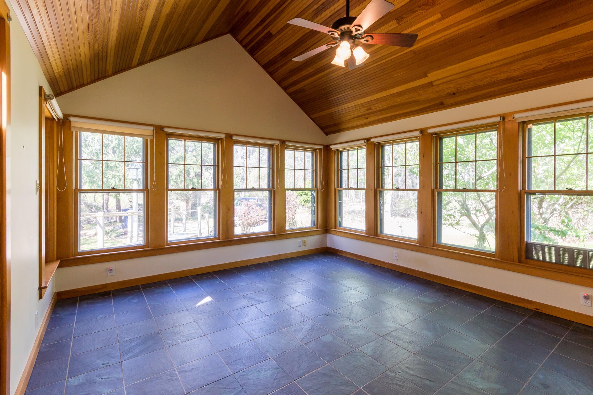 15 Jernegan Pond Road Edgartown, MA 02539 - Photo 8 of 31 an empty room with wooden floor and windows