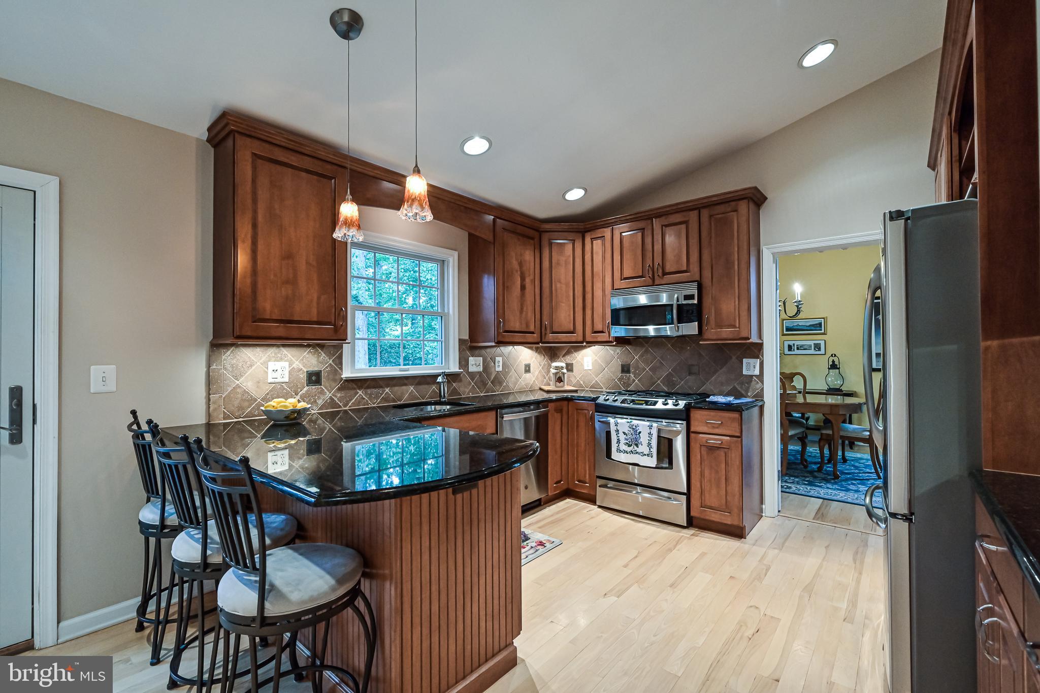 9010 Parliament Drive Burke, VA 22015 - Photo 11 of 40 Stunning remodeled kitchen with granite countertop