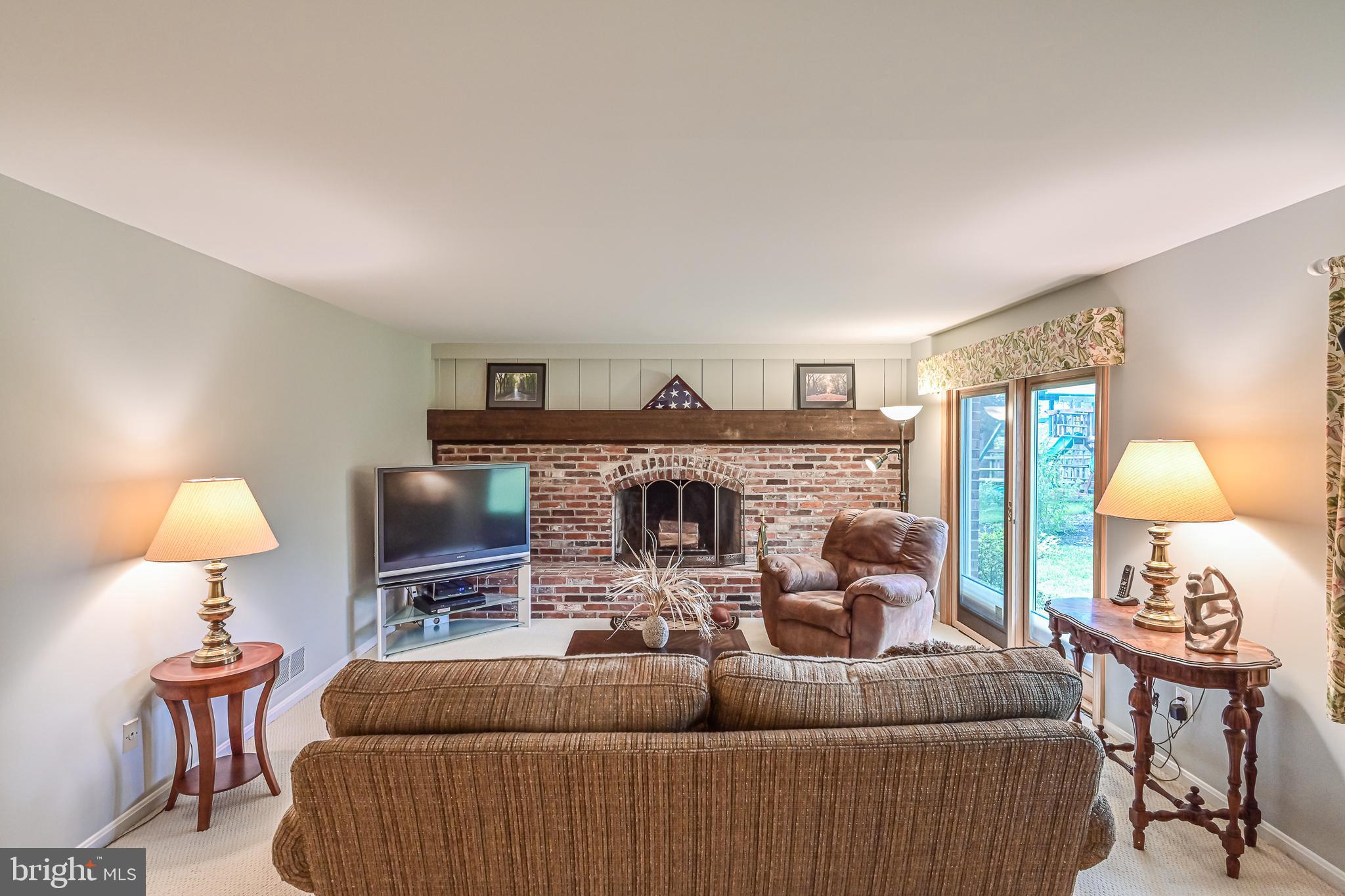 9010 Parliament Drive Burke, VA 22015 - Photo 28 of 40 Sliding glass doors lead to back yard
