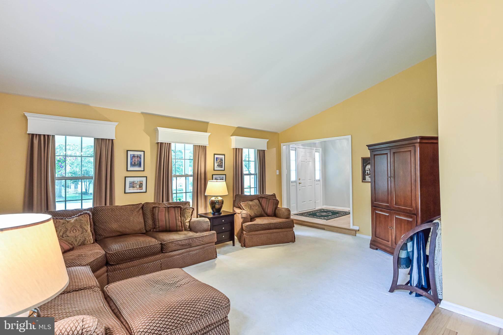 9010 Parliament Drive Burke, VA 22015 - Photo 8 of 40 Formal Living Room with custom window treatments