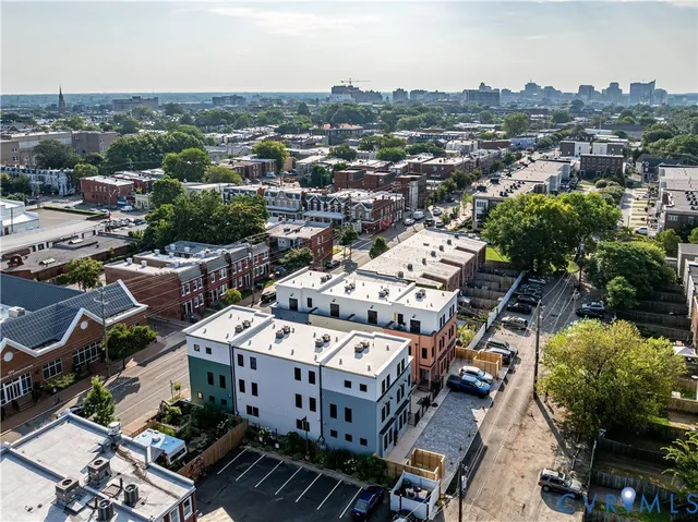an aerial view of a city with lots of residential buildings