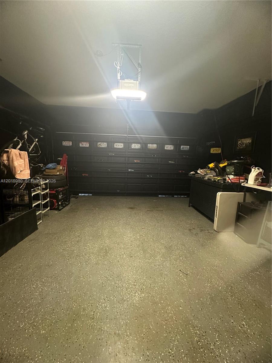 5402 Pointe Villa Drive, Unit B Lighthouse Point, FL 33064 - Photo 33 of 35 a view of a room with gym equipment