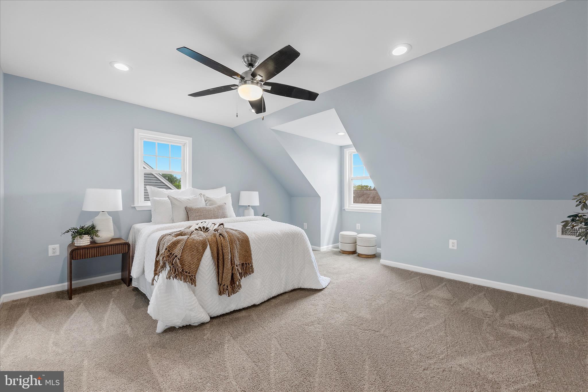 7400 Belclare Road Baltimore, MD 21222 - Photo 16 of 33 a spacious bedroom with a bed and a ceiling fan