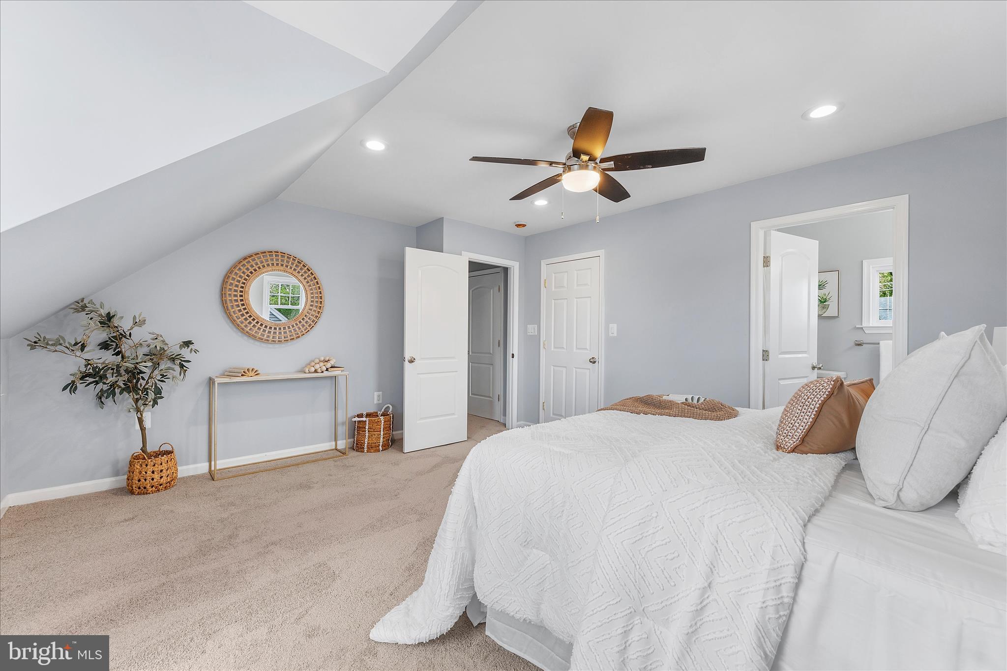 7400 Belclare Road Baltimore, MD 21222 - Photo 18 of 33 a bedroom with a bed and a chandelier