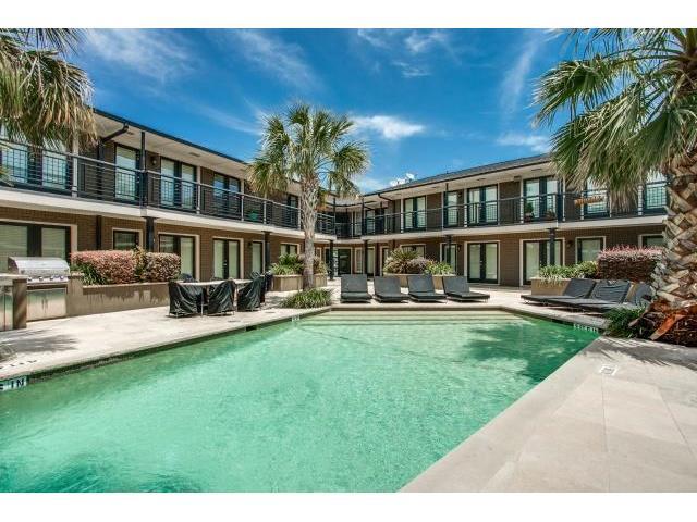 7770 Meadow Road, Unit 218 Dallas, TX 75230 - Photo 1 of 15 a view of a house with swimming pool and sitting area