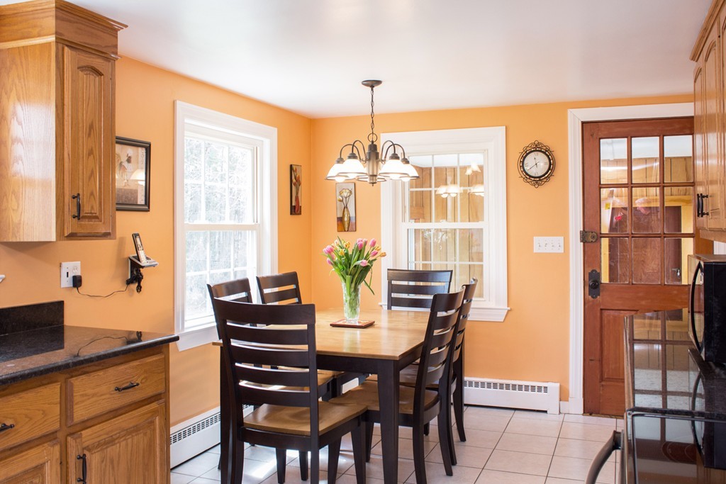 75 William Street Walpole, MA 02081 - Photo 3 of 27 a view of a dining room with furniture window and outside view