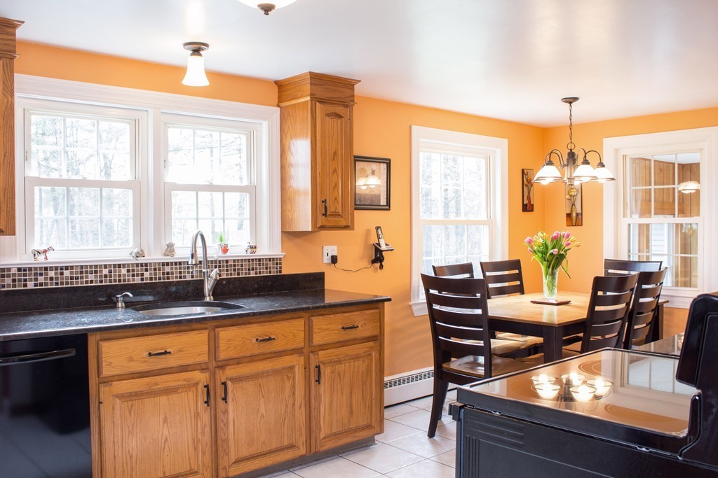 75 William Street Walpole, MA 02081 - Photo 5 of 27 a view of a kitchen counter top space and windows