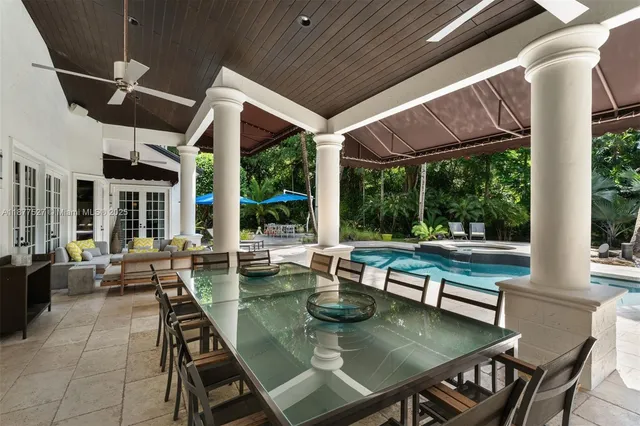 a outdoor dining space with furniture