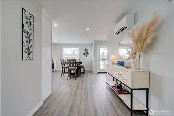 a kitchen with a table and chairs in it