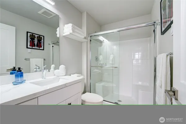 a bathroom with a shower and a shower curtain