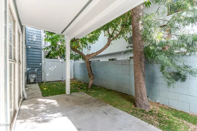 a backyard of a house with green space