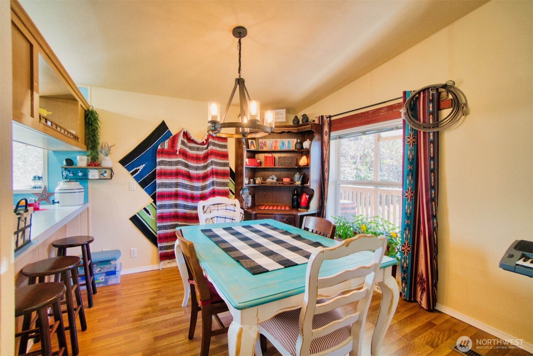 404 Meade Hill Road Glenoma, WA 98336 - Photo 11 of 40 a view of a dining room with furniture and chandelier