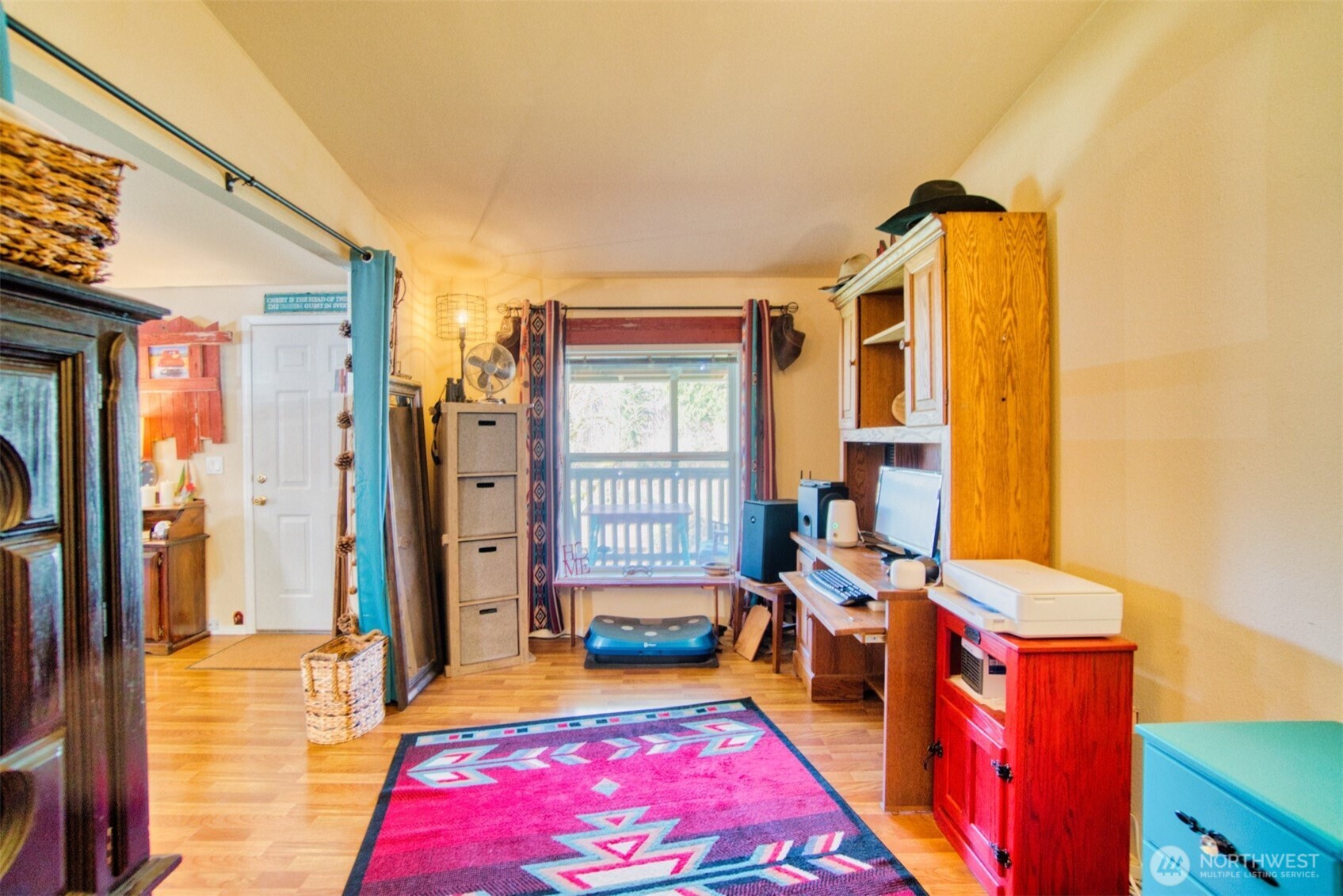 404 Meade Hill Road Glenoma, WA 98336 - Photo 18 of 40 a bedroom with a bed and wooden floor