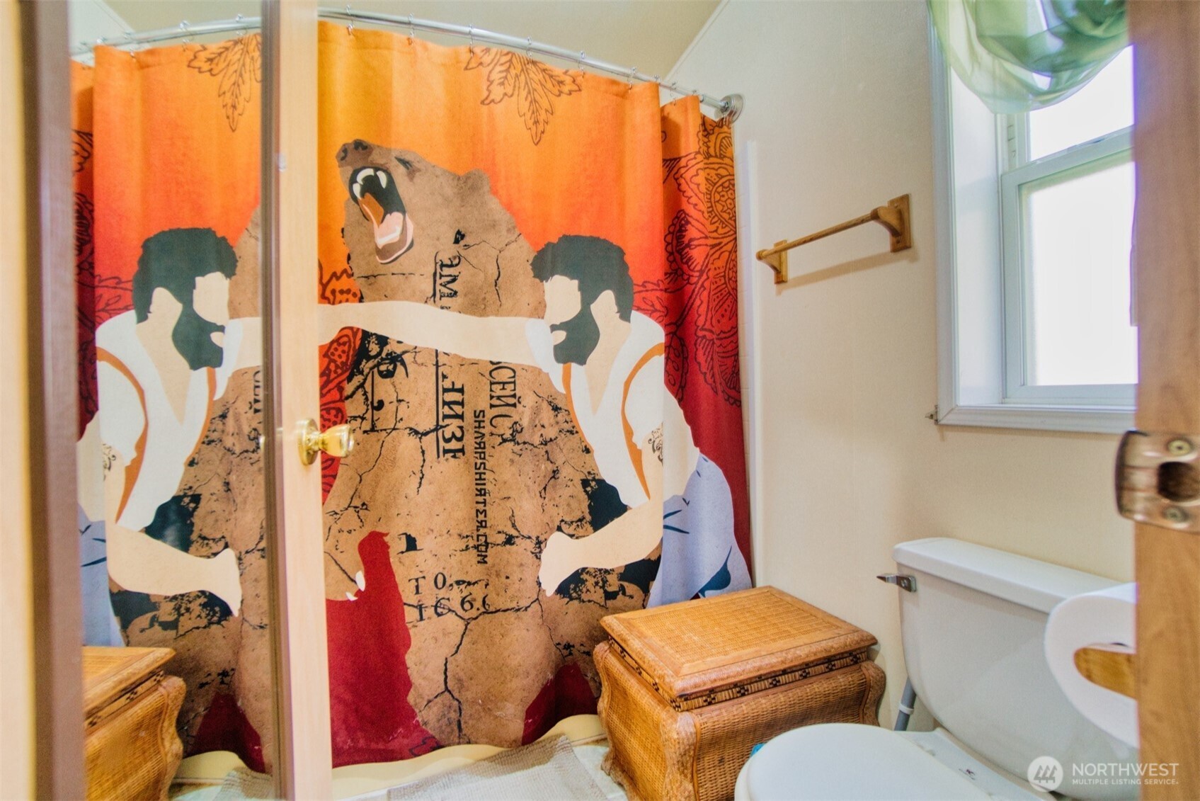404 Meade Hill Road Glenoma, WA 98336 - Photo 25 of 40 a bathroom with a toilet and a shower curtain