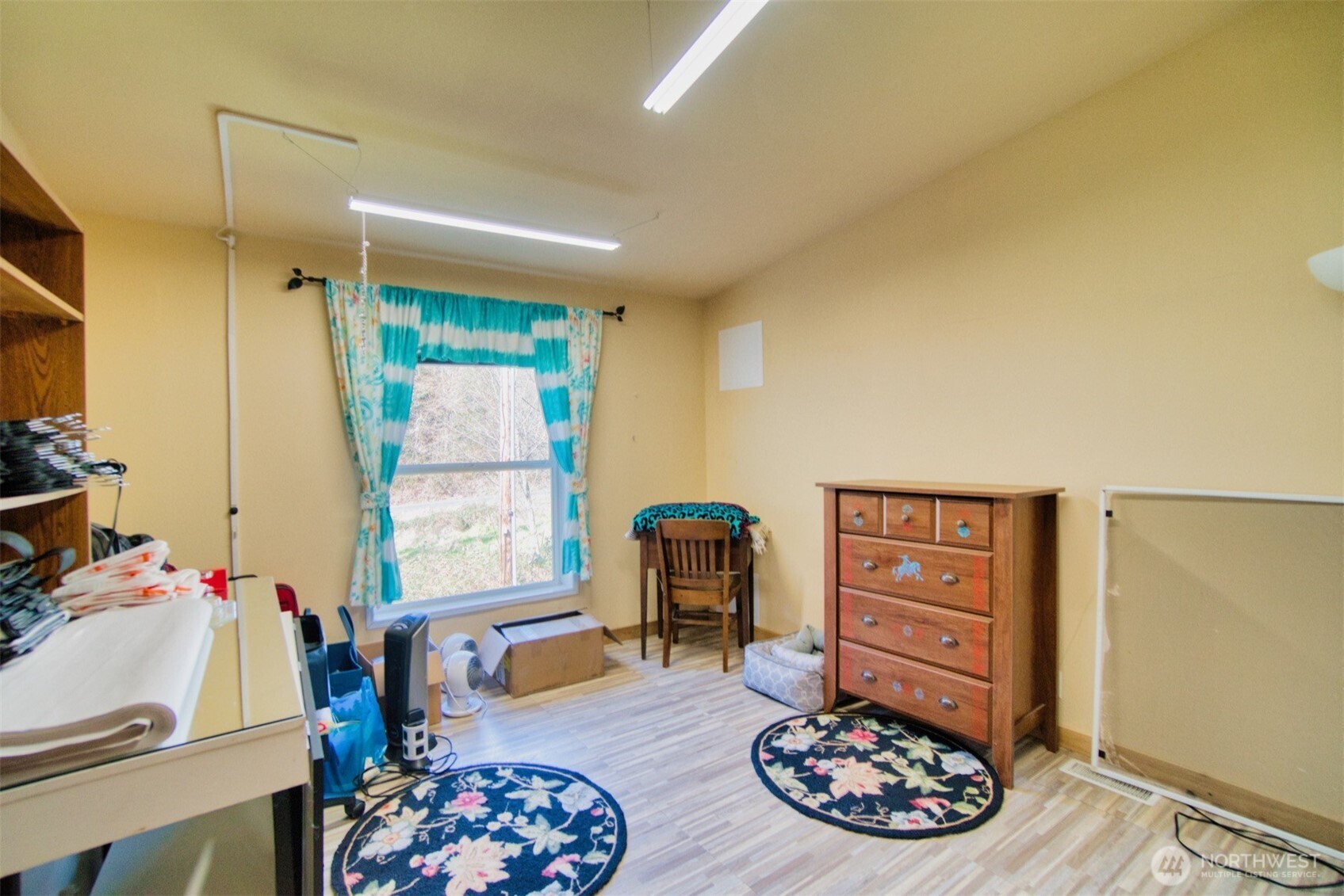 404 Meade Hill Road Glenoma, WA 98336 - Photo 26 of 40 a bedroom with furniture and a window