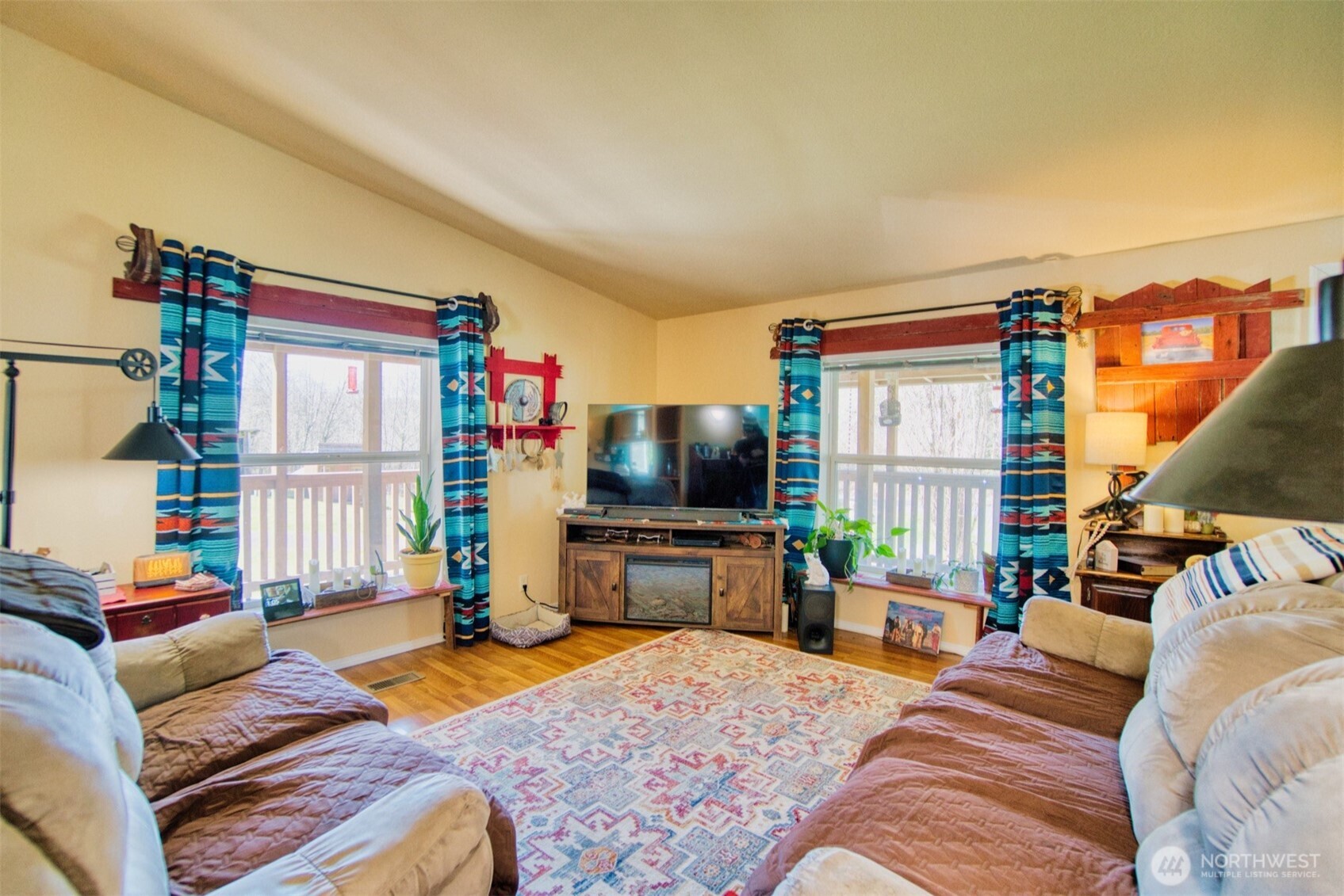 404 Meade Hill Road Glenoma, WA 98336 - Photo 10 of 40 a bedroom with furniture and a flat screen tv