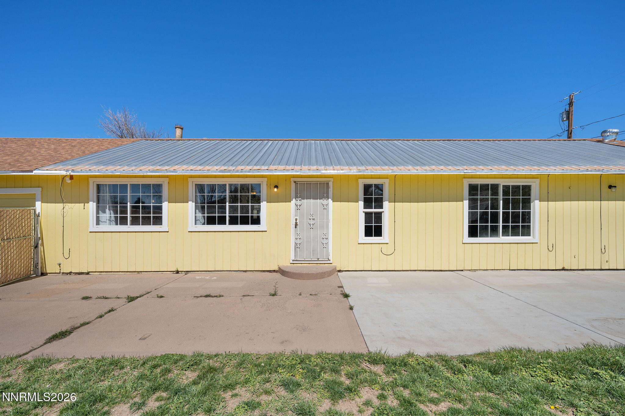 3590 Siskin Lane Reno, NV 89508 - Photo 29 of 31 a front view of a house with a yard