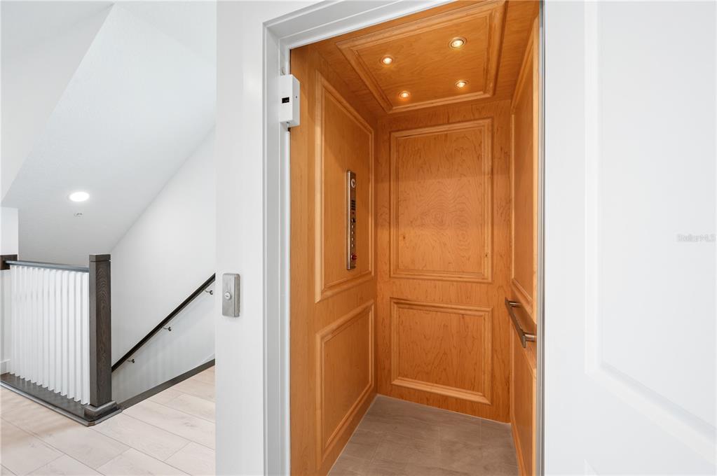 9973 Key Haven Road Seminole, FL 33777 - Photo 15 of 59 a view of a livingroom with stairs