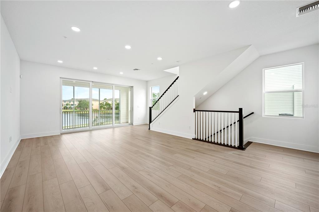 9973 Key Haven Road Seminole, FL 33777 - Photo 23 of 59 a view of an entryway with wooden floor