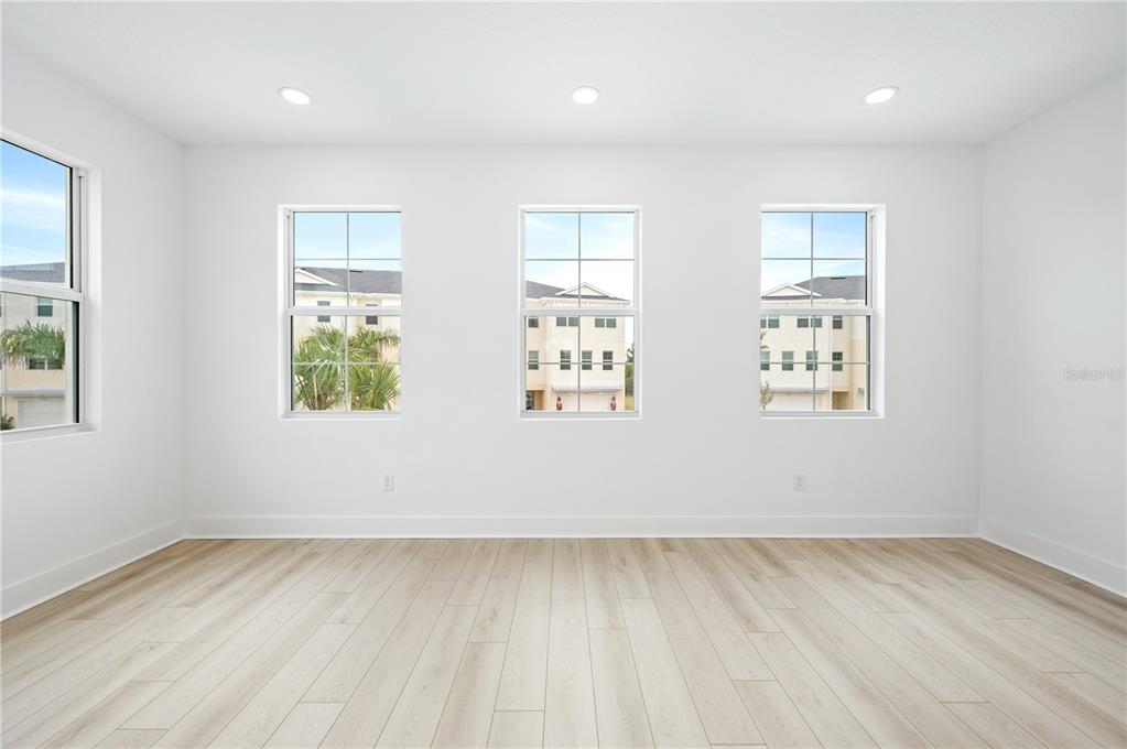 9973 Key Haven Road Seminole, FL 33777 - Photo 29 of 59 an empty room with windows