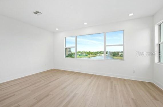 9973 Key Haven Road Seminole, FL 33777 - Photo 32 of 59 a view of an empty room with a window
