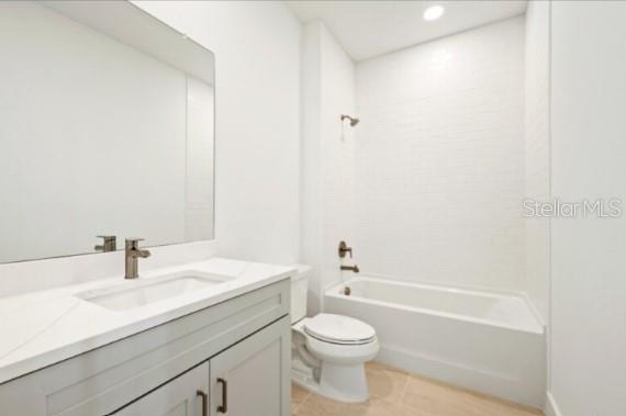 9973 Key Haven Road Seminole, FL 33777 - Photo 38 of 59 a bathroom with a sink a toilet and shower