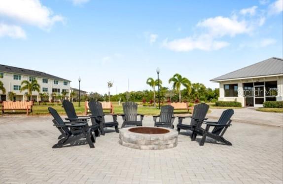 9973 Key Haven Road Seminole, FL 33777 - Photo 56 of 59 a view of a patio with a table and chairs