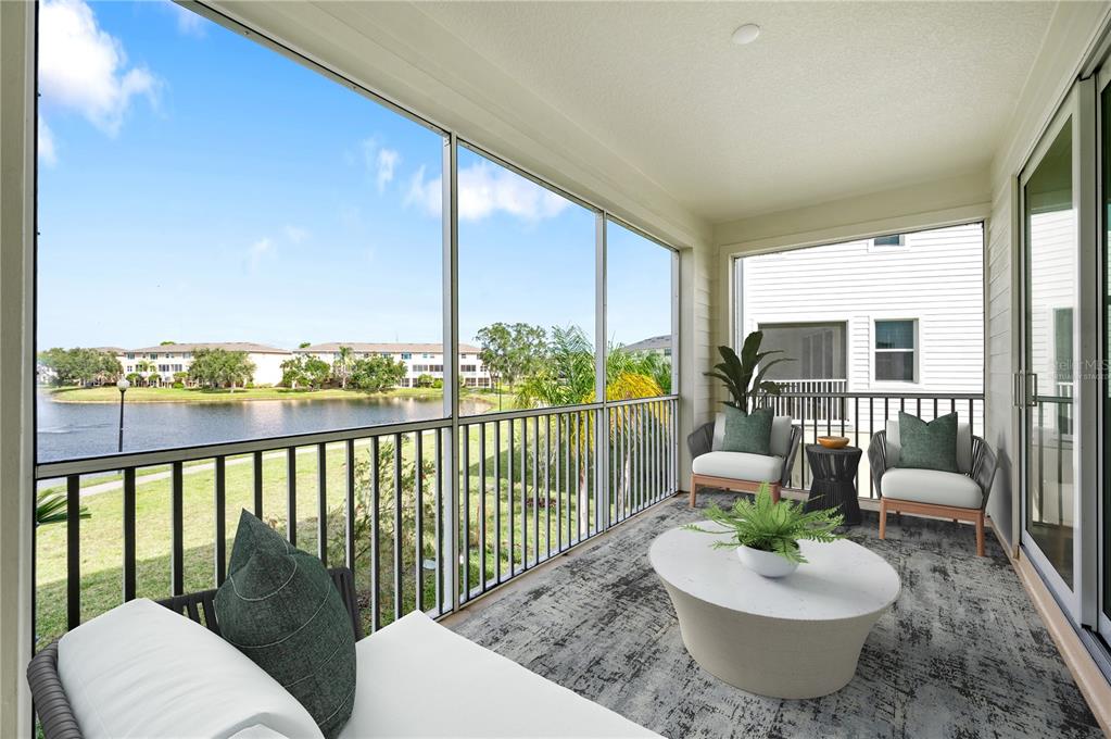 9973 Key Haven Road Seminole, FL 33777 - Photo 8 of 59 a living room with furniture and a floor to ceiling window