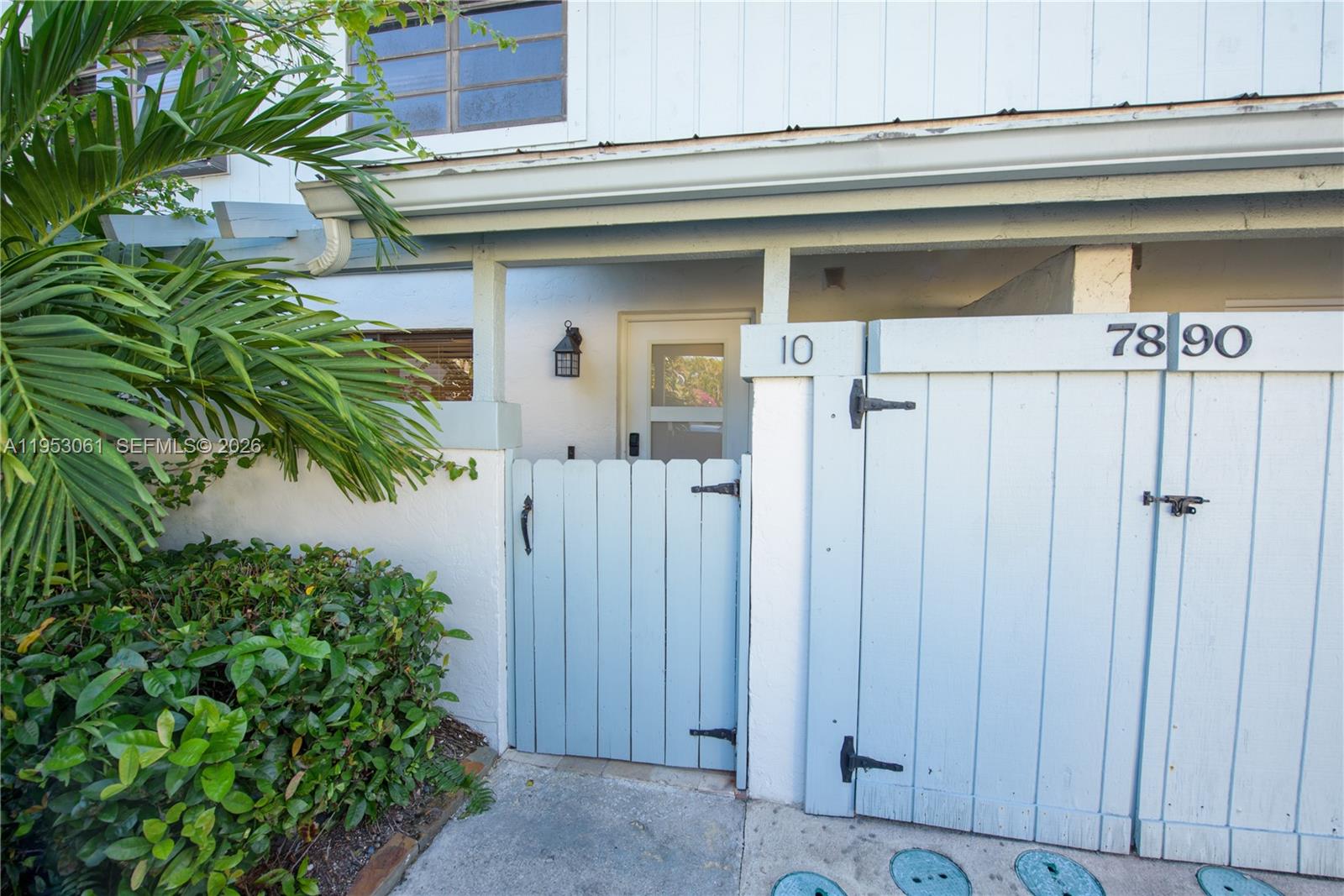 7890 Southwest 86th Street, Unit 10 Miami, FL 33156 - Photo 20 of 32 a view of a wooden door