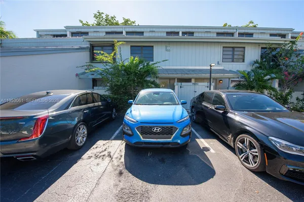 a car parked in front of a house