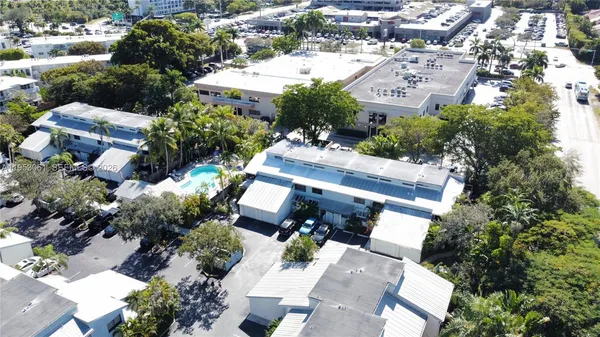 an aerial view of residential house with outdoor space and street view