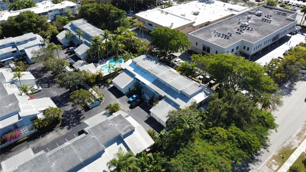 an aerial view of a house with a garden