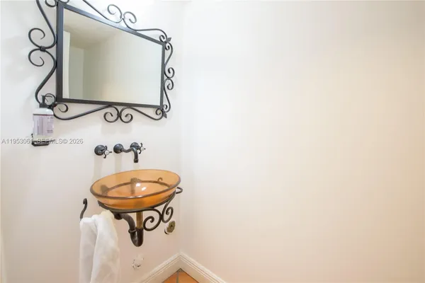 a bathroom with a toilet and a sink