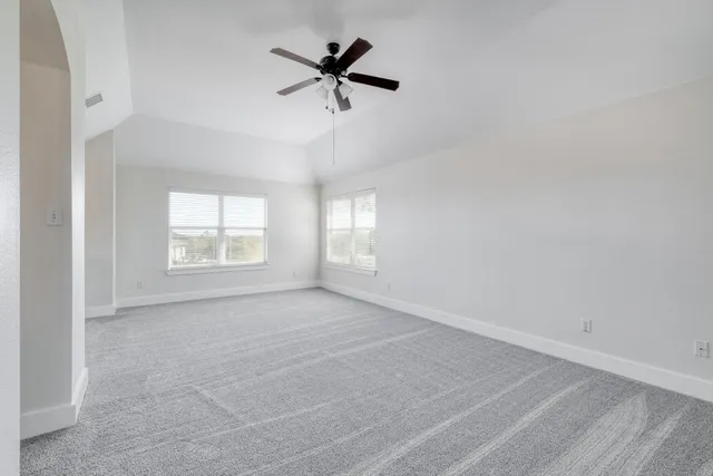 an empty room that has a window