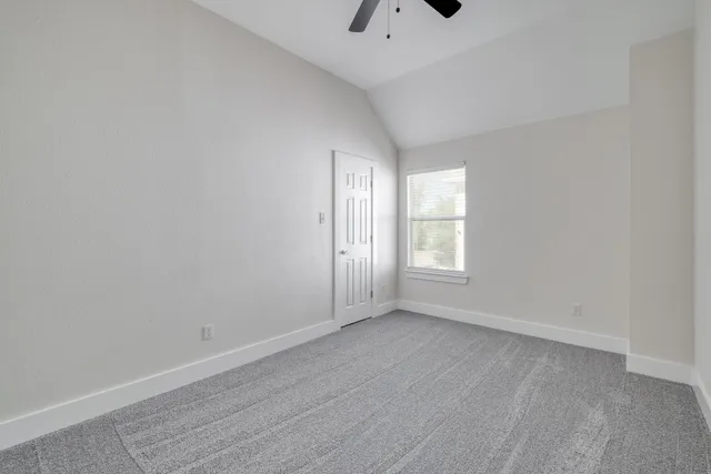 a bathroom with a granite countertop sink a toilet and a bathtub