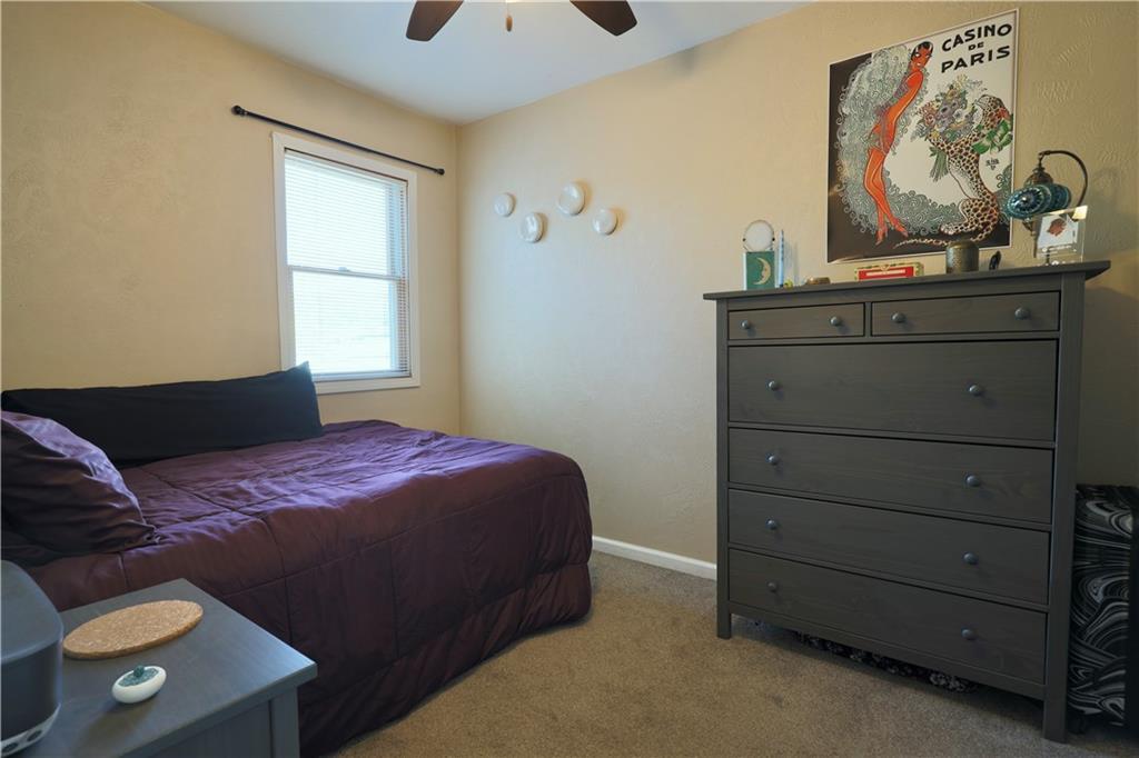 1923 Wharton Street Pittsburgh, PA 15203 - Photo 25 of 34 a bedroom with a bed and painting on the wall