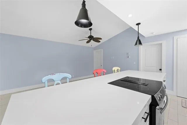 a close view of a sink and dishwasher in a kitchen