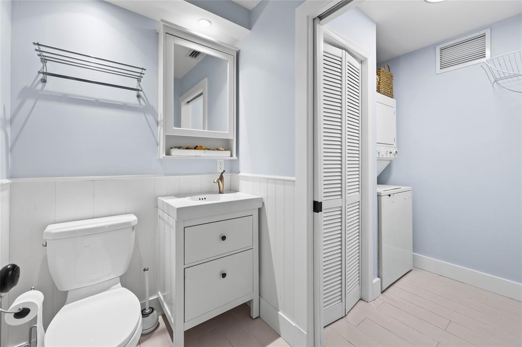 3937 Arelia Drive Delray Beach, FL 33445 - Photo 19 of 46 Half Bathroom/Laundry Room