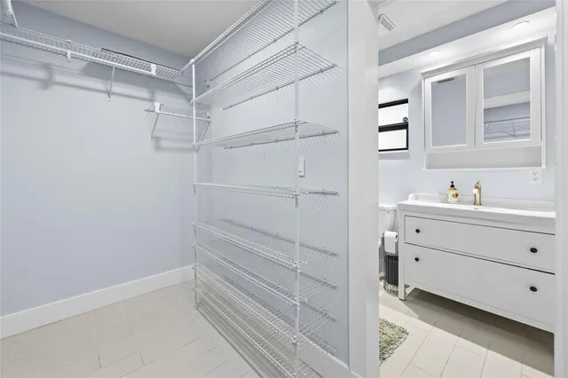 a view of an empty walk in closet