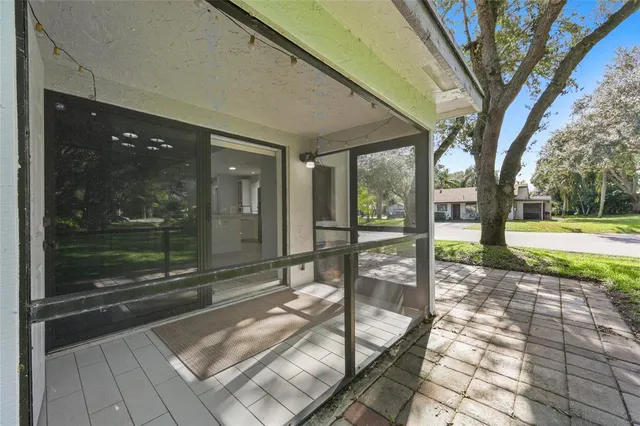 a view of a porch with a backyard