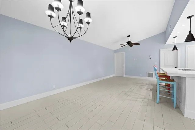 wooden floor in a hall with a window